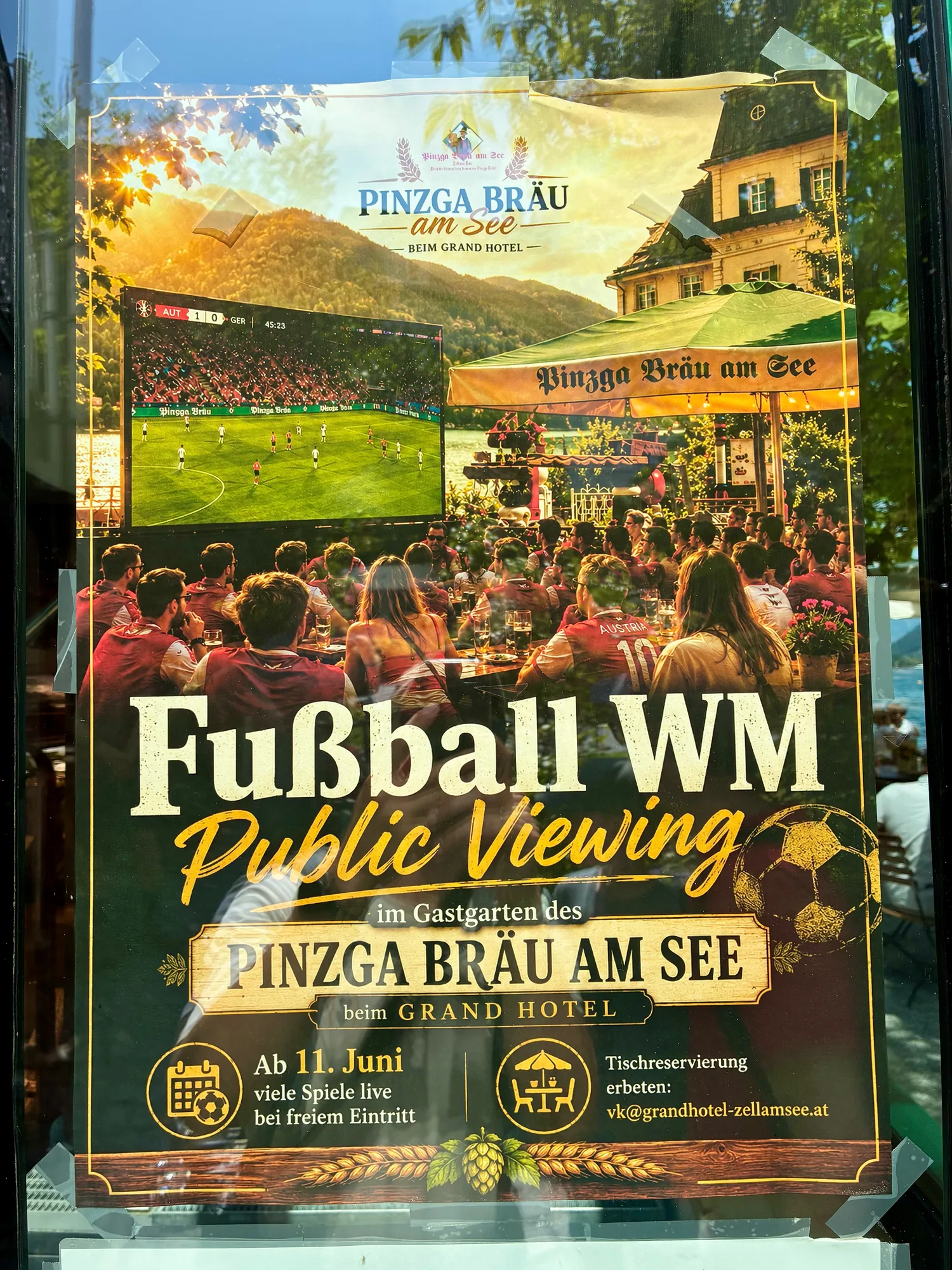 A football World Cup public viewing poster photographed in Zell am See